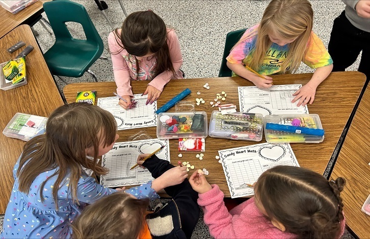 2nd grade students working on Candy Heart Math.